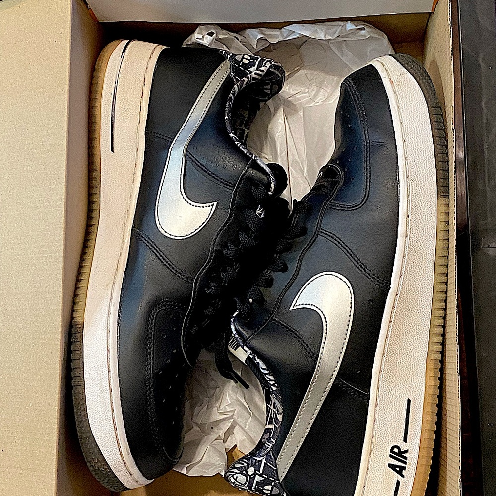 Air Force 1’s/10.5/Black and white with silver check and design on the inside.
